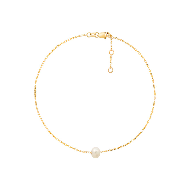 Złota bransoletka z perłą na kostkę