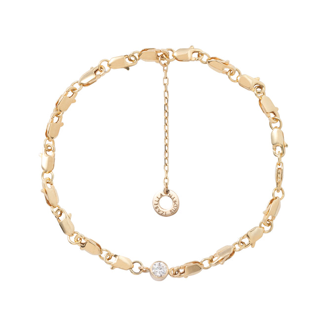 Étreinte Dorée – Złota bransoletka z diamentem w formie połączonych zapięć