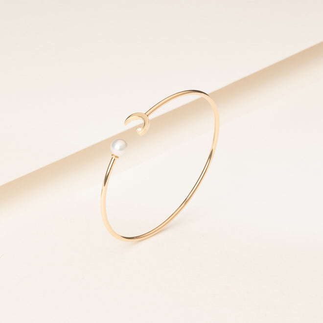 Złota bransoletka z perłą i diamentem New Moon