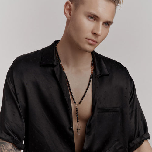 Złoty naszyjnik z białym howlitem